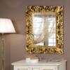 specchio con cornice oro