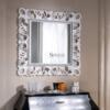 specchio con cornice bianca
