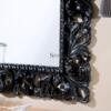 specchio con cornice nera